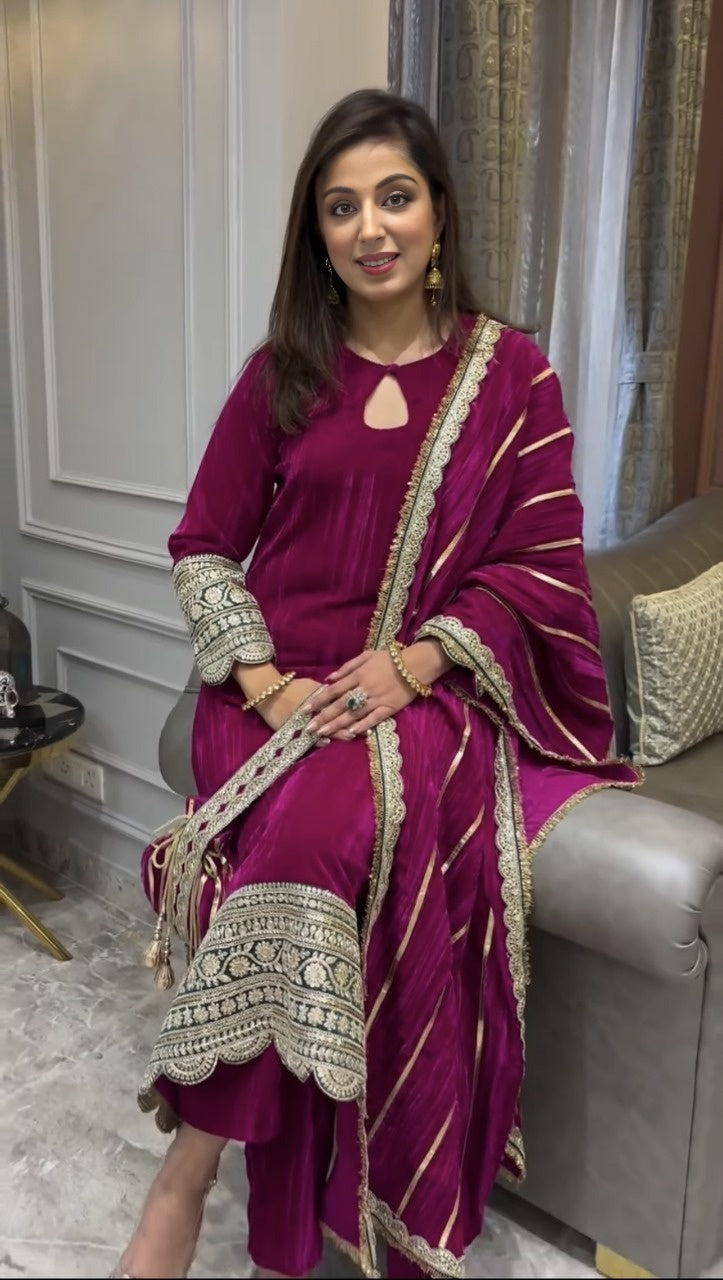 "Elegant Rani-pink Suits: Perfect for the Winter Chill"